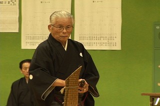 Tl[