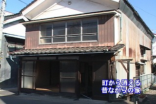 Tl[