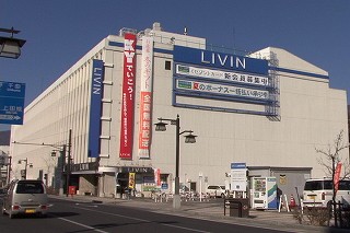 Tl[