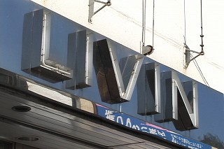 Tl[