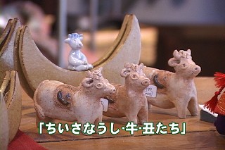 Tl[
