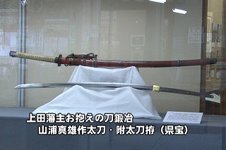 Tl[